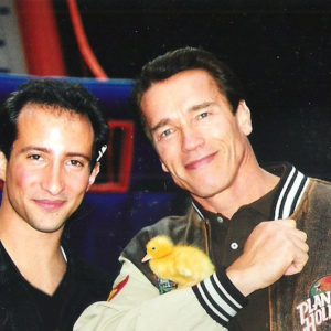 Simon Winthrop with Arnold Schwarzenegger
