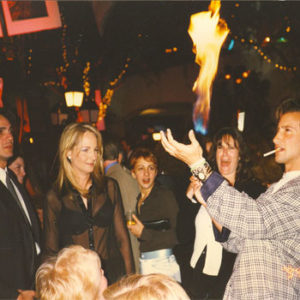 Celebrities Helen Hunt and Hank Azria watch Simon perform magic in California at a movie premiere