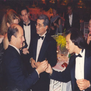 CEOs Ronald Perelman and Terry Semel enjoy some CEO-VIP MAGIC entertainment by Corporate magician Simon Winthrop